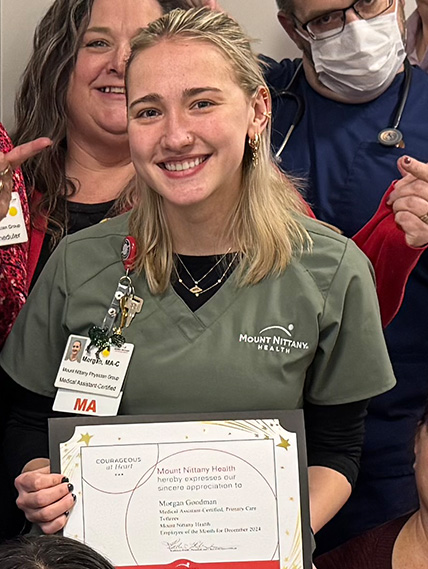 Morgan Goodman celebrates being the employee of the month for december 2024